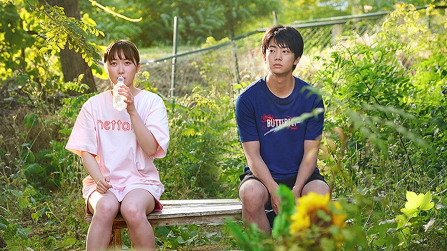 Kotera-san Climbs! - Kotera and Kondo sitting on a bench
